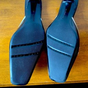 Black and white kitten heel slip on pumps